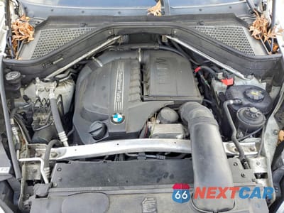 Zdjęcie 12 z 13 samochodu: 2013 BMW X5 XDRIVE35I VIN:5UXZV4C56D0E03723 - miniatura