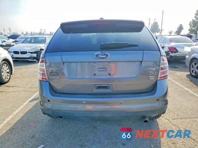 Zdjęcie 6 z 13 samochodu: 2010 FORD EDGE SEL VIN:2FMDK4JC0ABB59852 - miniatura