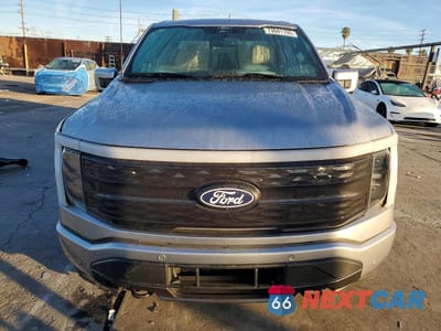 Piąte zdjęcie samochodu w środku: 2024 FORD F150 LIGHTNING PLATINUM VIN:1FT6W7L70RWG01977 - miniatura