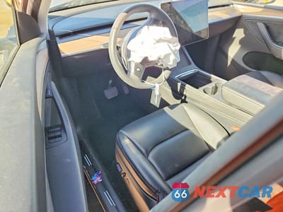 Zdjęcie 8 z 12 samochodu: 2023 TESLA MODEL Y VIN:7SAYGDEE6PA120651 - miniatura