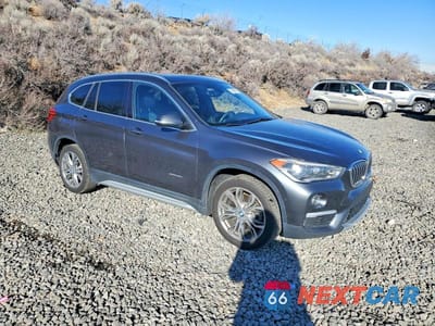 Czwarte zdjęcie samochodu z boku: 2017 BMW X1 XDRIVE28I VIN:WBXHT3Z31H4A54314 - miniatura