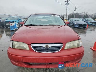 Piąte zdjęcie samochodu w środku: 1999 MAZDA 626 ES VIN:1YVGF22C3X5818622 - miniatura