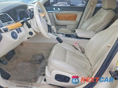 Zdjęcie 7 z 12 samochodu: 2011 LINCOLN MKS VIN:1LNHL9FT9BG609867 - miniatura