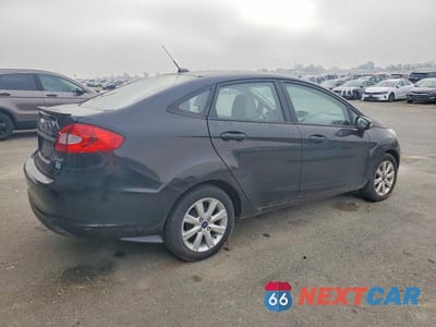 Trzecie zdjęcie samochodu z tyłu: 2013 FORD FIESTA SE VIN:3FADP4BJXDM223231 - miniatura