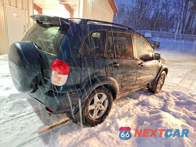 Trzecie zdjęcie samochodu z tyłu: 2002 TOYOTA RAV4 BASE VIN:JTEHH20V020143774 - miniatura