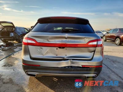 Zdjęcie 6 z 11 samochodu: 2016 LINCOLN MKX SELECT VIN:2LMTJ6KR6GBL59791 - miniatura