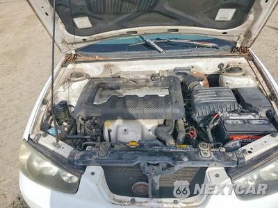 Zdjęcie 11 z 12 samochodu: 2001 HYUNDAI ELANTRA GLS VIN:KMHDN45D21U185325 - miniatura