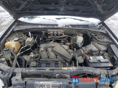 Zdjęcie 12 z 15 samochodu: 2005 MERCURY MARINER VIN:4M2CU57105DJ05306 - miniatura