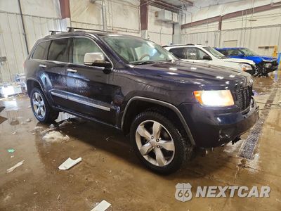 Czwarte zdjęcie samochodu z boku: 2011 JEEP GRAND CHEROKEE OVERLAND VIN:1J4RR6GT1BC501426 - miniatura