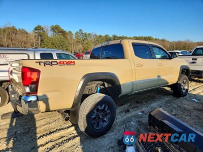 Trzecie zdjęcie samochodu z tyłu: 2018 TOYOTA TACOMA DOUBLE CAB VIN:3TMDZ5BN9JM038905 - miniatura