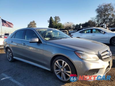 Czwarte zdjęcie samochodu z boku: 2014 MERCEDES-BENZ E 350 4MATIC VIN:WDDHF8JB1EA878754 - miniatura