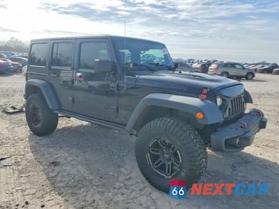 Czwarte zdjęcie samochodu z boku: 2014 JEEP WRANGLER UNLIMITED RUBICON VIN:1C4HJWFG0EL160778 - miniatura