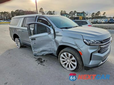 Czwarte zdjęcie samochodu z boku: 2024 CHEVROLET SUBURBAN K1500 PREMIER VIN:1GNSKFKDXRR140921 - miniatura