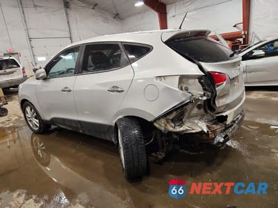 Drugie zdjęcie samochodu z przodu: 2010 HYUNDAI TUCSON VIN:KM8JUCAC8AU047186 - miniatura