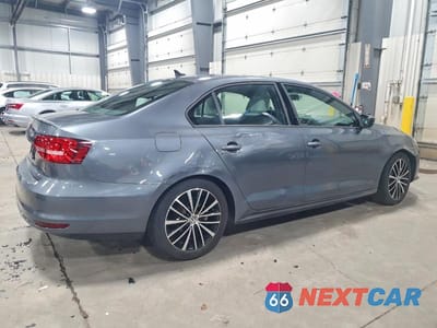 Trzecie zdjęcie samochodu z tyłu: 2015 VOLKSWAGEN JETTA SE VIN:3VWD17AJ7FM420873 - miniatura