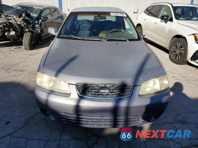 Piąte zdjęcie samochodu w środku: 2000 NISSAN SENTRA BASE VIN:3N1CB51A0YL385671 - miniatura