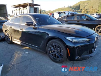 Czwarte zdjęcie samochodu z boku: 2024 BMW I4 EDRIVE 35 VIN:WBY43AW0XRFS86390 - miniatura