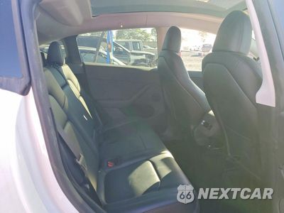 Zdjęcie 11 z 14 samochodu: 2023 TESLA MODEL Y VIN:7SAYGDEE1PA151600 - miniatura