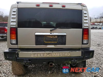 Zdjęcie 6 z 13 samochodu: 2004 HUMMER H2 VIN:5GRGN23U04H102723 - miniatura