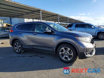 Czwarte zdjęcie samochodu z boku: 2018 HONDA CR-V EX VIN:7FARW1H5XJE024552 - miniatura