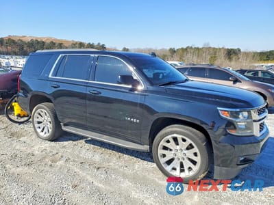Czwarte zdjęcie samochodu z boku: 2018 CHEVROLET TAHOE C1500 LT VIN:1GNSCBKC9JR294733 - miniatura