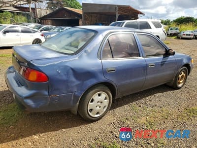 Trzecie zdjęcie samochodu z tyłu: 2000 TOYOTA COROLLA VIN:1NXBR12E0YZ363315 - miniatura
