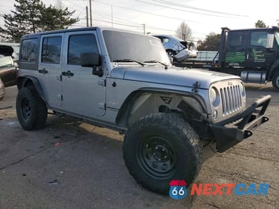 Czwarte zdjęcie samochodu z boku: 2014 JEEP WRANGLER UNLIMITED SAHARA VIN:1C4BJWEGXEL186926 - miniatura