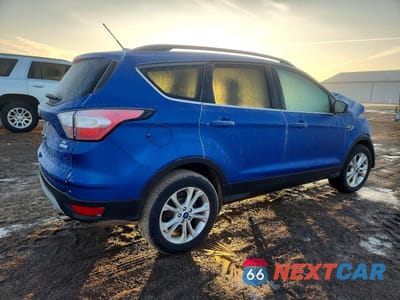 Trzecie zdjęcie samochodu z tyłu: 2018 FORD ESCAPE SE VIN:1FMCU0GD7JUB23696 - miniatura