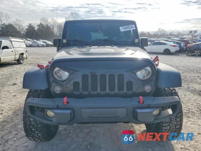 Piąte zdjęcie samochodu w środku: 2014 JEEP WRANGLER UNLIMITED RUBICON VIN:1C4HJWFG0EL160778 - miniatura