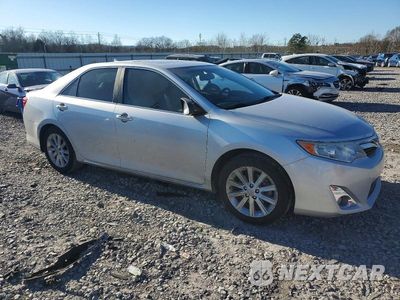 Czwarte zdjęcie samochodu z boku: 2012 TOYOTA CAMRY HYBRID VIN:4T1BD1FKXCU031101 - miniatura