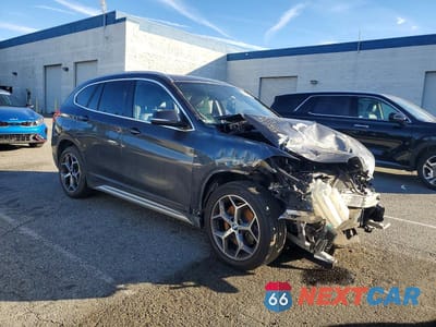 Czwarte zdjęcie samochodu z boku: 2018 BMW X1 SDRIVE28I VIN:WBXHU7C32J5H44893 - miniatura