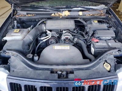Zdjęcie 12 z 13 samochodu: 2010 JEEP GRAND CHEROKEE LAREDO VIN:1J4PR4GK3AC104530 - miniatura