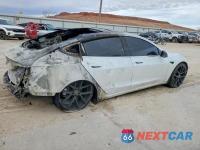 Trzecie zdjęcie samochodu z tyłu: 2019 TESLA MODEL 3 VIN:5YJ3E1EA7KF416010 - miniatura