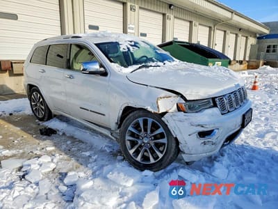 Czwarte zdjęcie samochodu z boku: 2018 JEEP GRAND CHEROKEE OVERLAND VIN:1C4RJFCG9JC454599 - miniatura