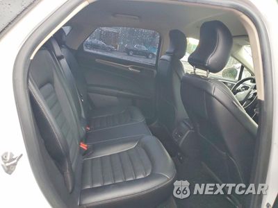 Zdjęcie 10 z 12 samochodu: 2017 FORD FUSION SE HYBRID VIN:3FA6P0LUXHR409189 - miniatura