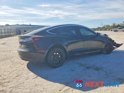 Trzecie zdjęcie samochodu z tyłu: 2019 TESLA MODEL 3 VIN:5YJ3E1EA7KF397801 - miniatura