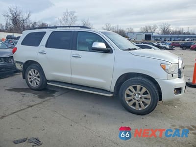 Czwarte zdjęcie samochodu z boku: 2010 TOYOTA SEQUOIA PLATINUM VIN:5TDDW5G17AS027111 - miniatura