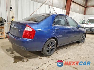 Trzecie zdjęcie samochodu z tyłu: 2004 KIA SPECTRA LX VIN:KNAFE121145046501 - miniatura