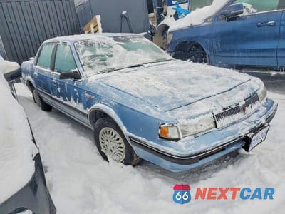 Czwarte zdjęcie samochodu z boku: 1992 OLDSMOBILE CUTLASS CIERA SL VIN:1G3AM51N1N6399098 - miniatura