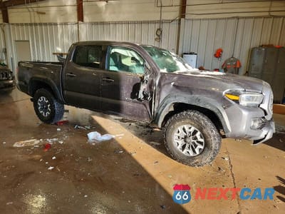 Czwarte zdjęcie samochodu z boku: 2023 TOYOTA TACOMA TRD OFF-ROAD VIN:3TMCZ5AN6PM540809 - miniatura