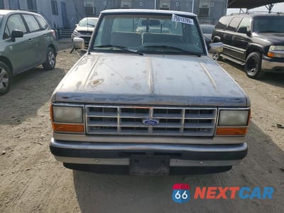 Piąte zdjęcie samochodu w środku: 1990 FORD RANGER VIN:1FTCR10X9LUA89876 - miniatura