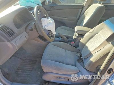 Zdjęcie 7 z 11 samochodu: 2002 TOYOTA CAMRY LE VIN:4T1BE32K32U075745 - miniatura