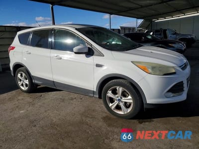 Czwarte zdjęcie samochodu z boku: 2014 FORD ESCAPE SE VIN:1FMCU0GX7EUB15968 - miniatura