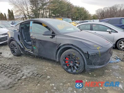 Czwarte zdjęcie samochodu z boku: 2023 TESLA MODEL Y VIN:7SAYGDEE9PA186143 - miniatura