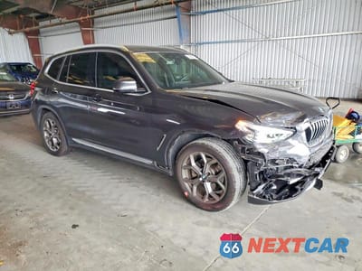 Czwarte zdjęcie samochodu z boku: 2021 BMW X3 XDRIVE30E VIN:5UXTS1C0XM9D79116 - miniatura