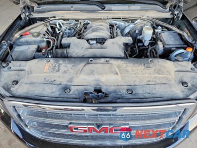 Zdjęcie 12 z 14 samochodu: 2018 GMC YUKON XL K1500 SLT VIN:1GKS2GKC9JR150015 - miniatura