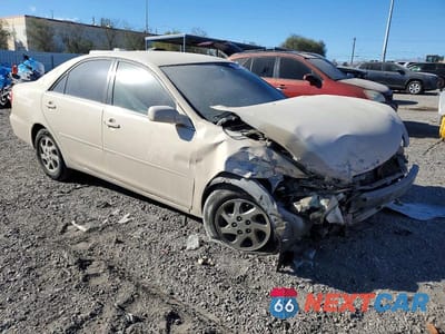 Czwarte zdjęcie samochodu z boku: 2004 TOYOTA CAMRY LE VIN:4T1BE32K74U801383 - miniatura