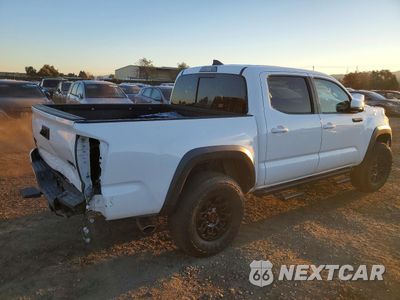 Trzecie zdjęcie samochodu z tyłu: 2018 TOYOTA TACOMA DOUBLE CAB VIN:5TFCZ5ANXJX155027 - miniatura