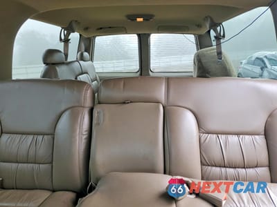 Zdjęcie 10 z 14 samochodu: 1999 CHEVROLET SUBURBAN C1500 VIN:3GNEC16R0XG196415 - miniatura