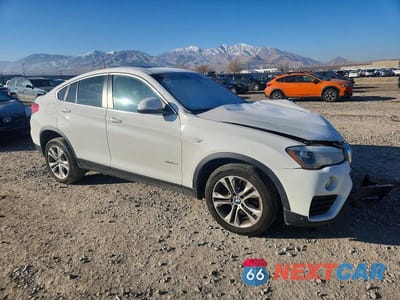 Czwarte zdjęcie samochodu z boku: 2015 BMW X4 XDRIVE28I VIN:5UXXW3C56F0M88867 - miniatura